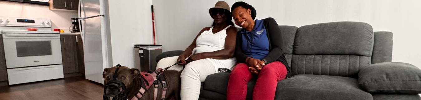 Wanda Donald and her dog Diamond and HEART worker