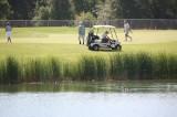 Golfers near Water Trap