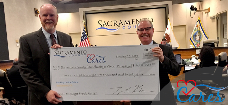 Employee Giving Campaign Check Presentation at Board of Supervisors Meeting