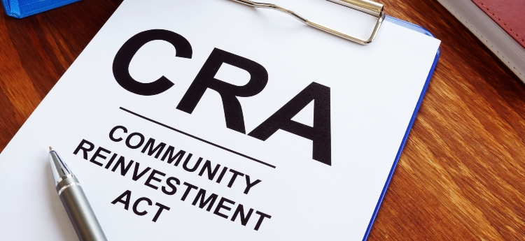 Community Reinvestment Act paper on a clipboard