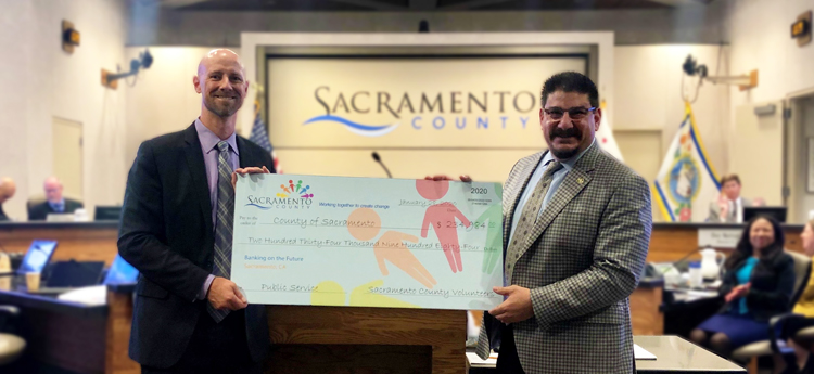 Employee Giving Campaign Check Presentation at Board of Supervisors Meeting