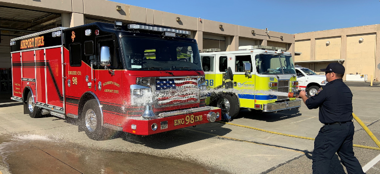 New Airport Fire Truck is Sprayed Down with Water