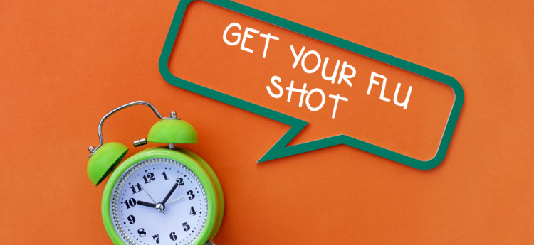 Get your flu shot - thought bubble next to a clock 