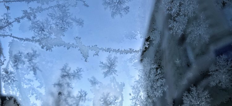 Car window that is frosted over 