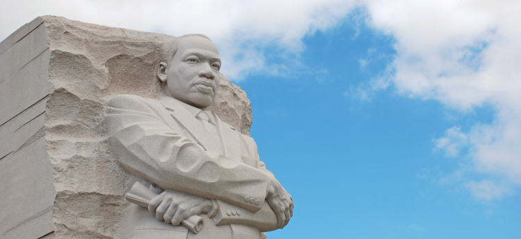 Martin Luther Kin Jr. Statue Against Blue Sky