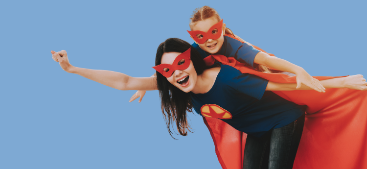 Mother and daughter dressed as super heroes