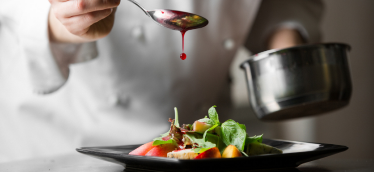 Chef Dressing a Salad