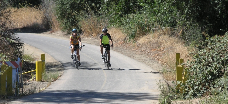 Two bicyclist riding on the American River Parkway Multi-use Trail