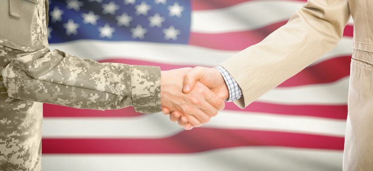 Handshake in front of an American flag 
