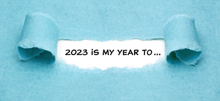 Torn paper revealing "2023 is my year to..."